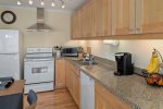 The kitchen is well equipped with modern appliances and amenities
